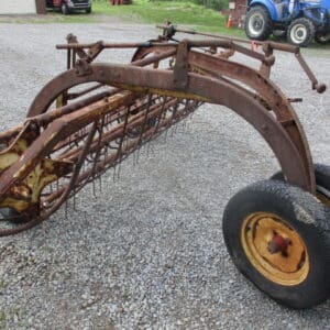 New Holland 56 dolly wheel rake